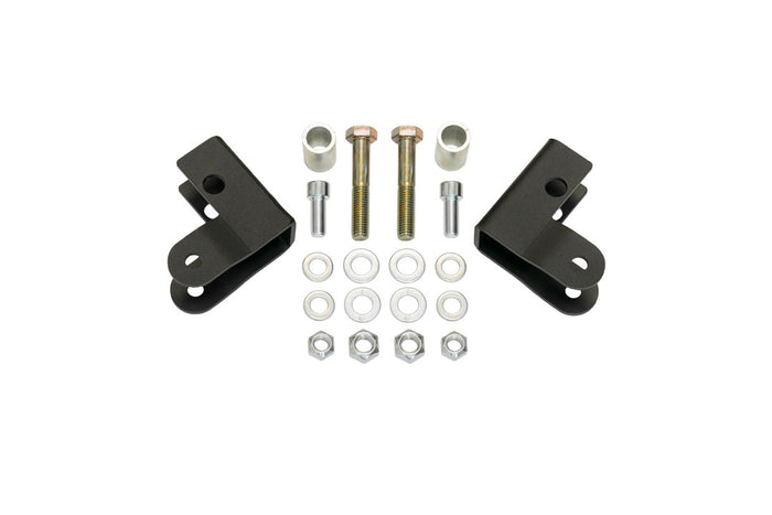 REAR HIGH CLEARANCE SHOCK EXTENSION BRACKETS - TRANSIT (2013+) by VAN COMPASS: A collection of metal parts and nuts designed to improve under axle ground clearance and protect shocks.
