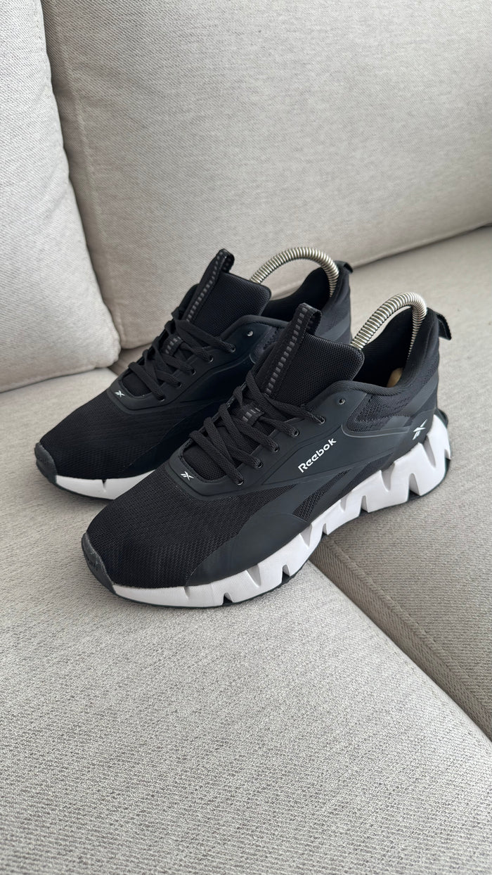 REBOOK SIG NEGRO BLANCO PROMO