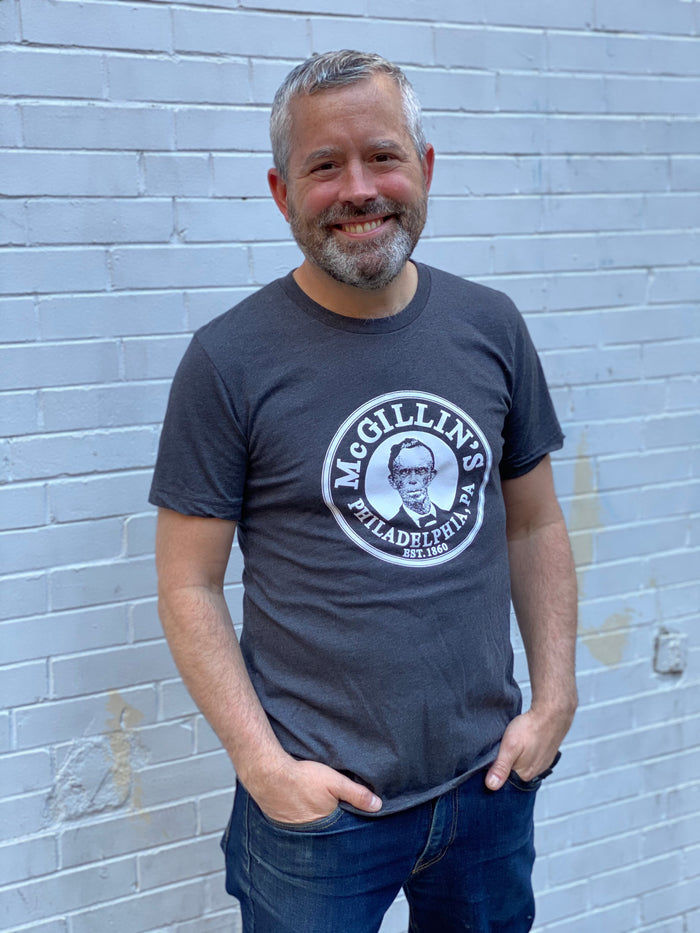 A gray t-shirt with 'McGillin's Olde Ale House' logo