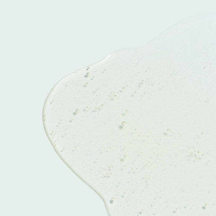 Clear gel texture of AGELESS total anti-aging serum | IMAGE Skincare shown on a light background, highlighting its smooth and hydrating skincare formulation.