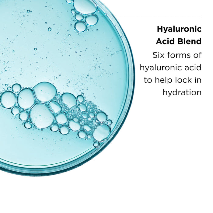 Close-up of a light blue liquid with bubbles representing a hyaluronic acid blend, highlighting six forms of hyaluronic acid to help lock in hydration for AGLESS total pure hyaluronic 6 filler | IMAGE Skincare.