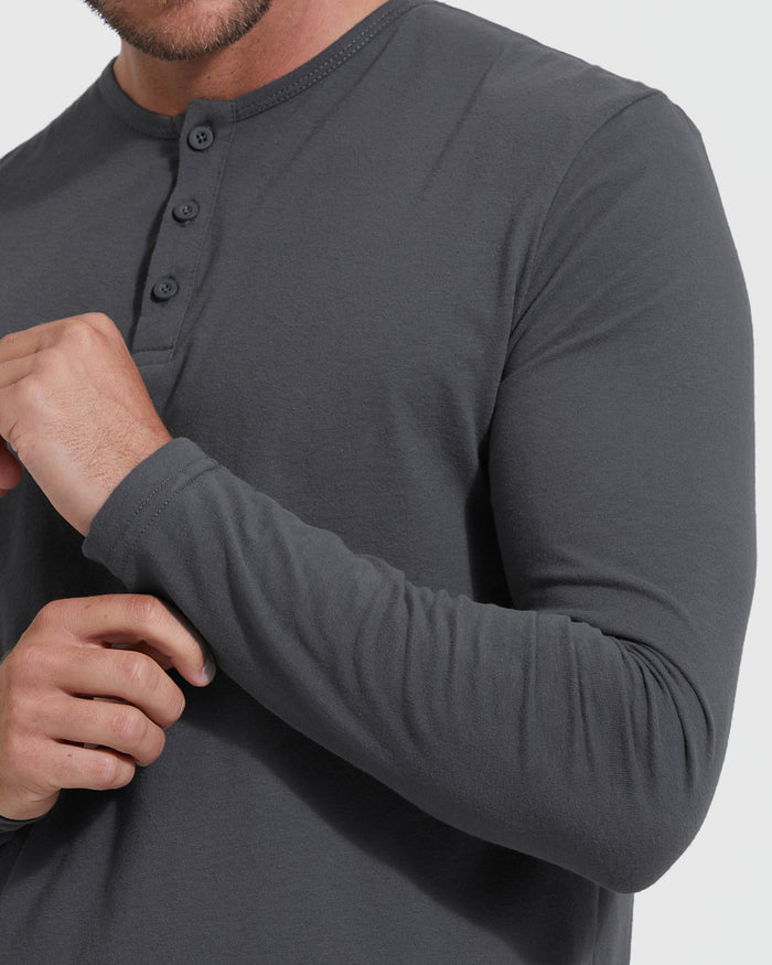 Carbon Classic Long Sleeve Henley with three-button placket, model adjusts cuff.