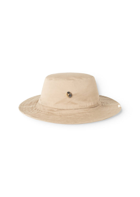 Bright brown cap with rounded top and visible button on the front.