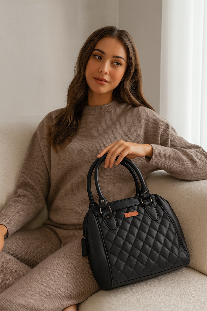 Women’s black quilted vegan leather top handle satchel shoulder crossbody bag-model image