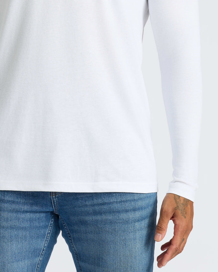 Person wearing White Classic Long Sleeve Crew Neck from Black & White 10-Pack.