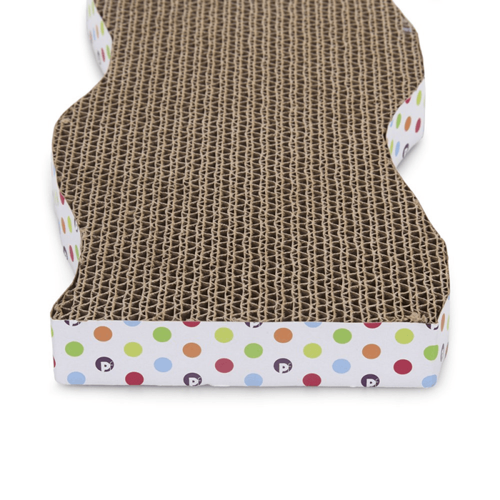 Close up of wave shaped corrugated cardboard scratcher with spotty details around the outside on a white background.