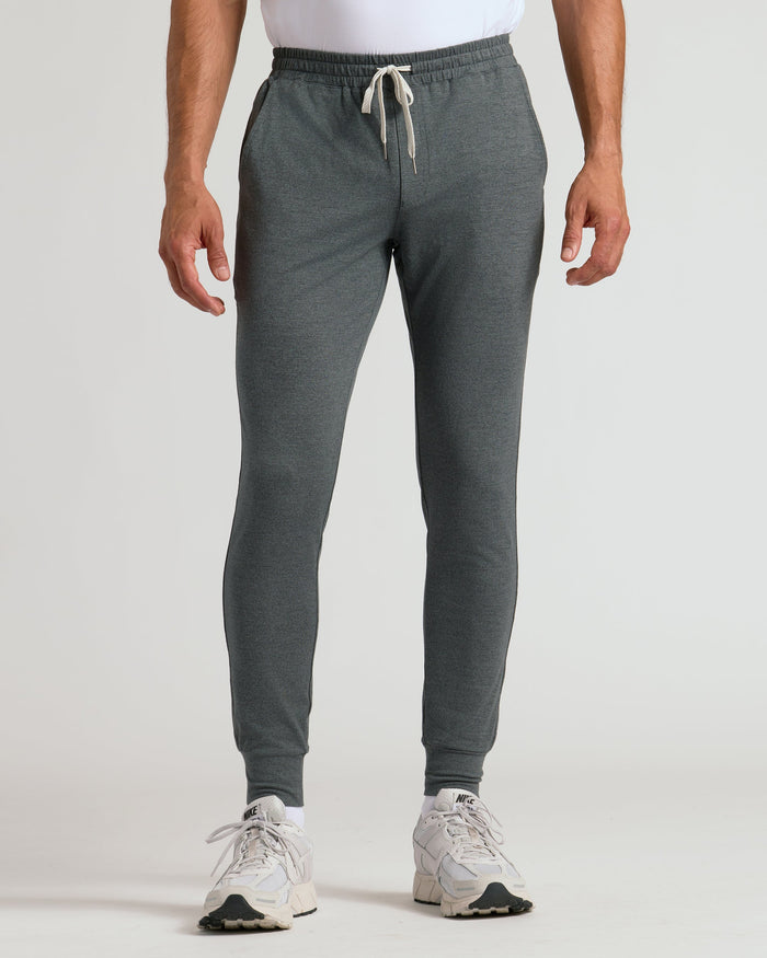 Charcoal Heather Gray Active Joggers with white drawstring and fitted cuffs.