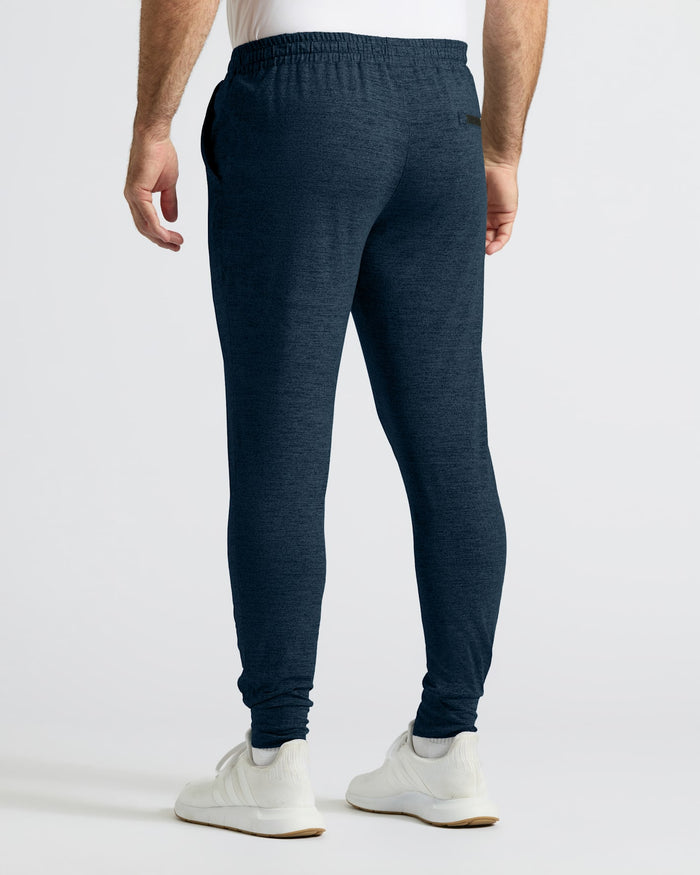 Dark Heather Navy Active Joggers with elastic waistband and white sneakers.