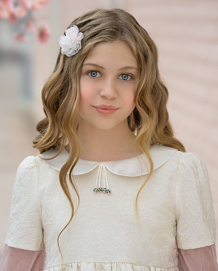 Cherry Blossom white and pink hair clip worn on the side of the hair, showcasing a dainty floral accessory for girls special occasions