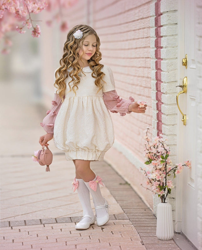 Cherry Blossom white and pink hair clip with a classic dress, creating a timeless spring and holiday outfit