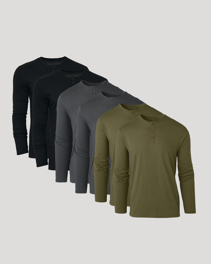 Set of four long-sleeve shirts in black, gray, and green on a light gray background