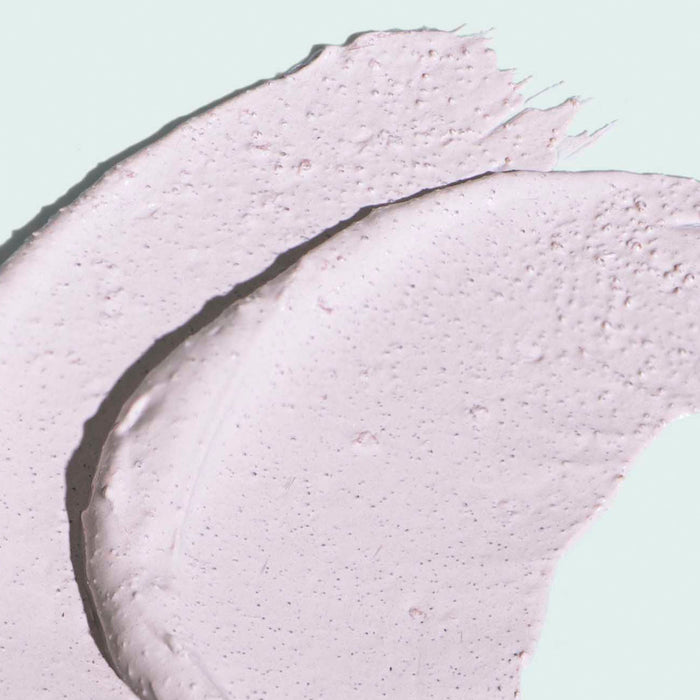 Close-up of smooth, light lavender cream texture of CLEAR CELL clarifying salicylic masque | IMAGE Skincare, highlighting its gentle exfoliating and clarifying properties for skincare.