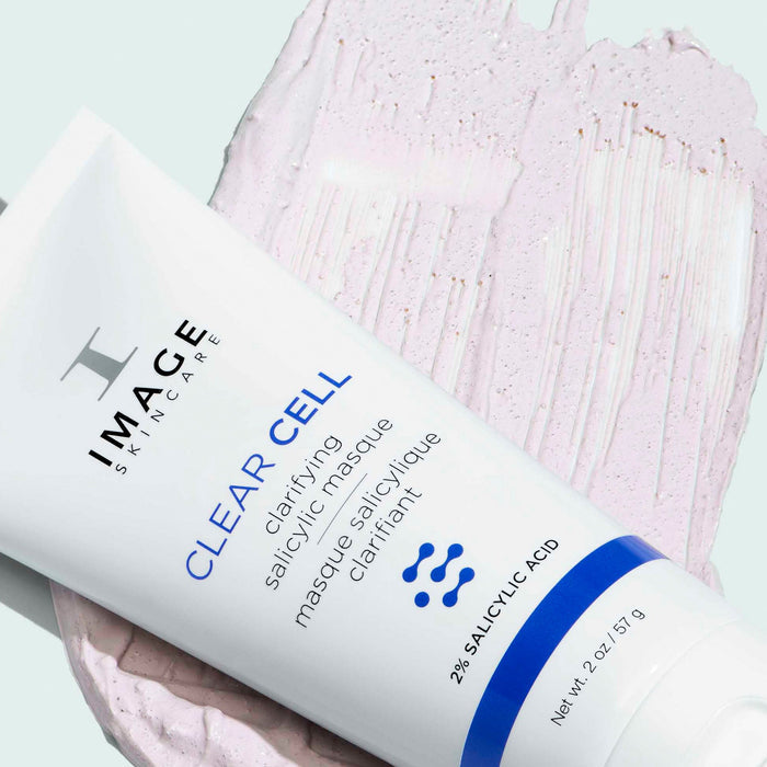 CLEAR CELL clarifying salicylic masque | IMAGE Skincare tube shown with a textured smear of the light purple masque, highlighting its skincare benefits and salicylic acid content.