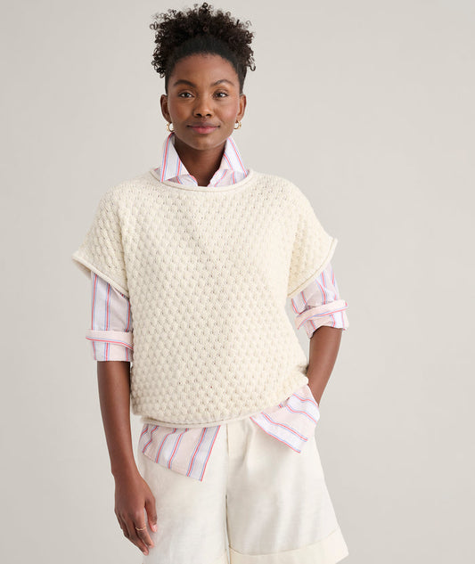 Model is wearing UNTUCKit Cotton Cap Sleeve Emily Sweater.