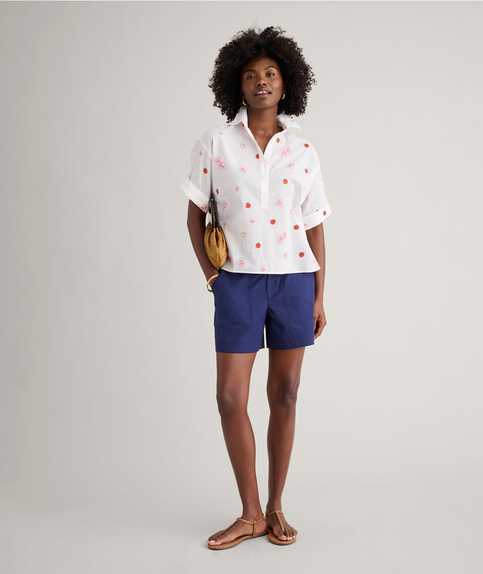 Model is wearing UNTUCKit Cotton Tomato Print Chrissy Shirt in Tomato Print.