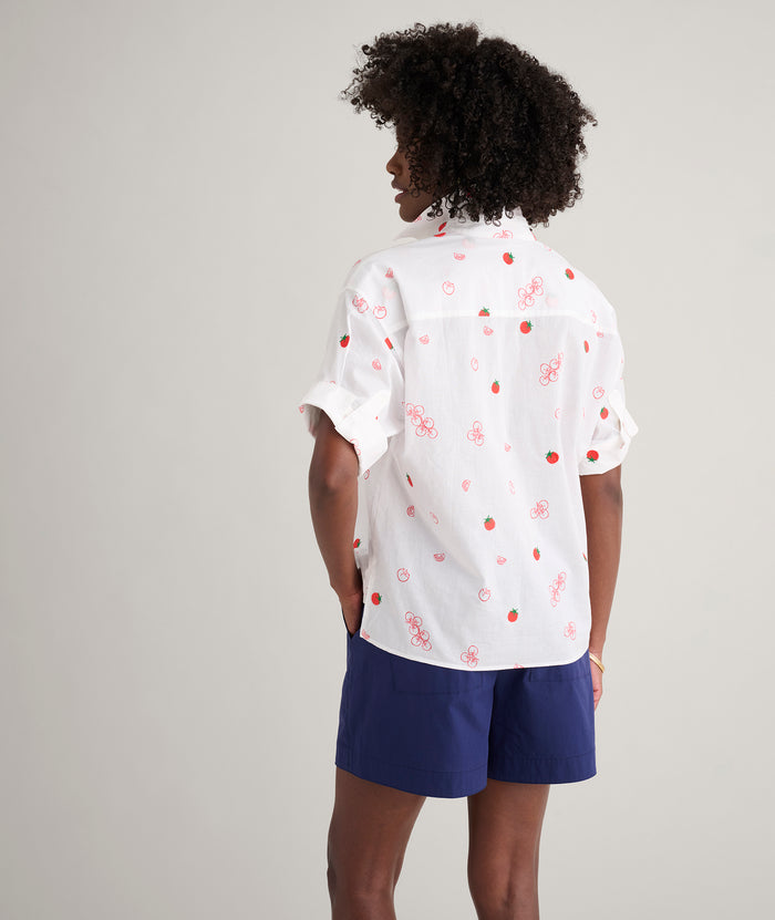 Model is wearing UNTUCKit Cotton Tomato Print Chrissy Shirt in Tomato Print.