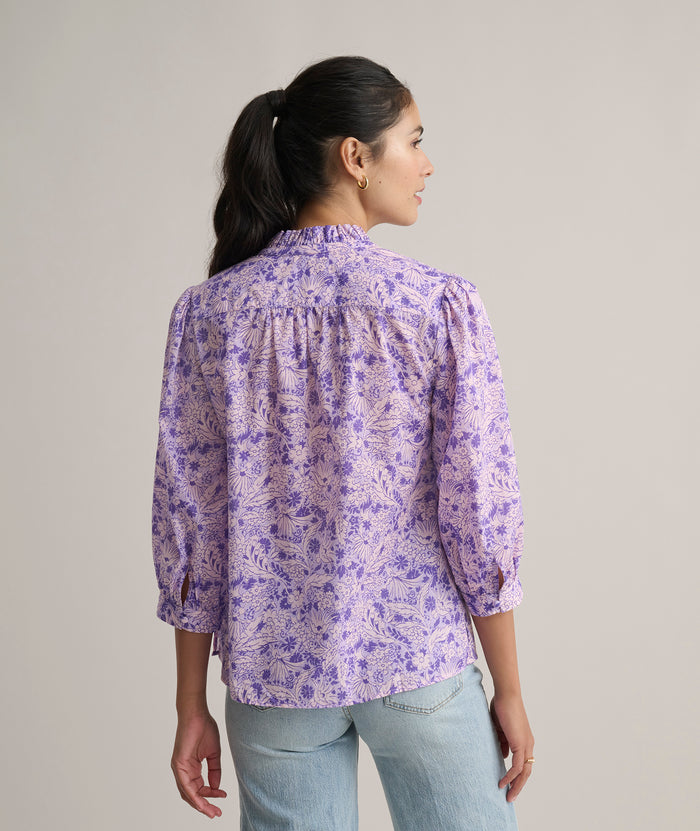 Model is wearing UNTUCKit Charlie shirt in floral print.