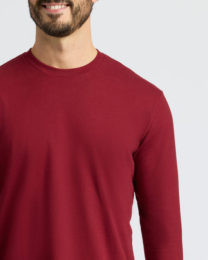 Burgundy Classic Long Sleeve Crew shirt worn by smiling bearded man.