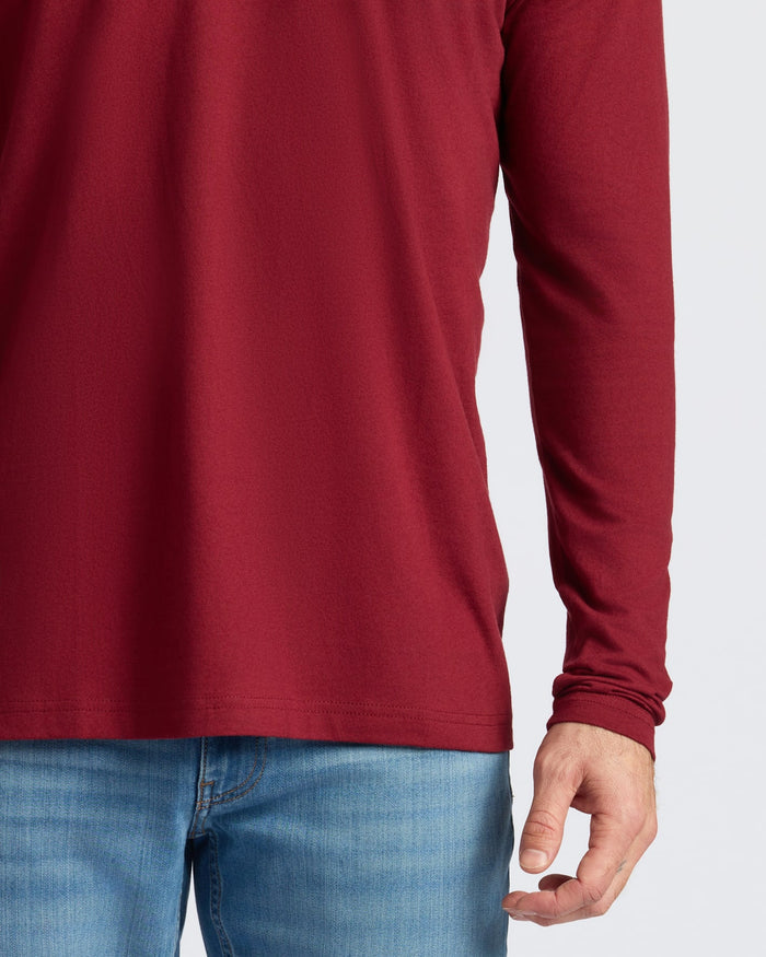 Dark Maroon Classic Long Sleeve Crew Neck with light-blue jeans.