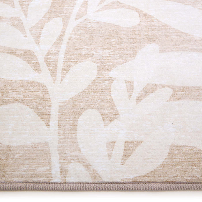 Eden Leaves Natural Eco-Washable Runner- 100% recycled polyester runner featuring a white floral pattern.