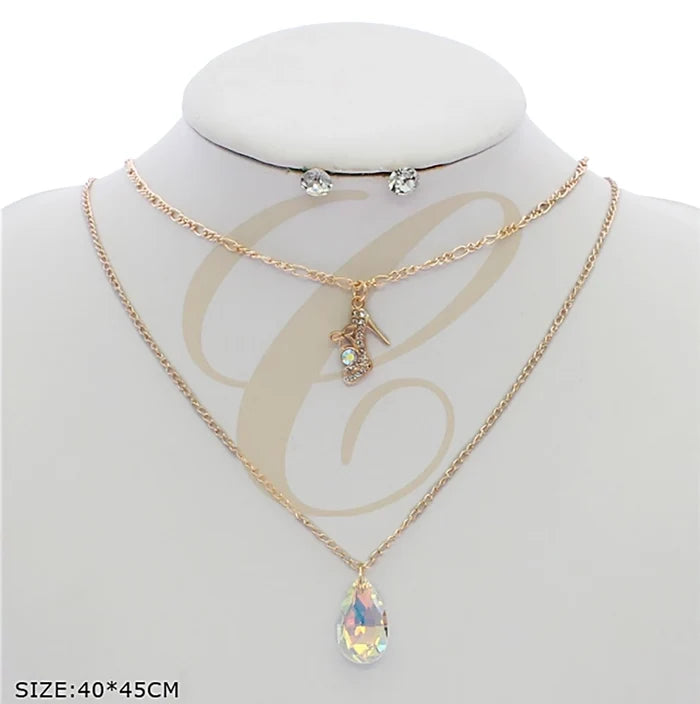 Elegant Crystal Layered Necklace & Stud Earring Set – High Heel & Teardrop Charms (RNK-0660GS)