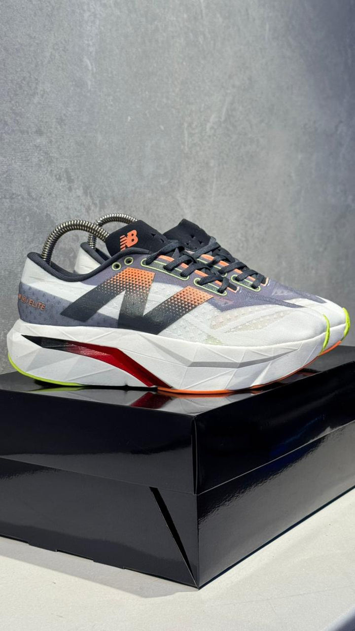 NEW BALANCE ELITE GRIS ROJO
