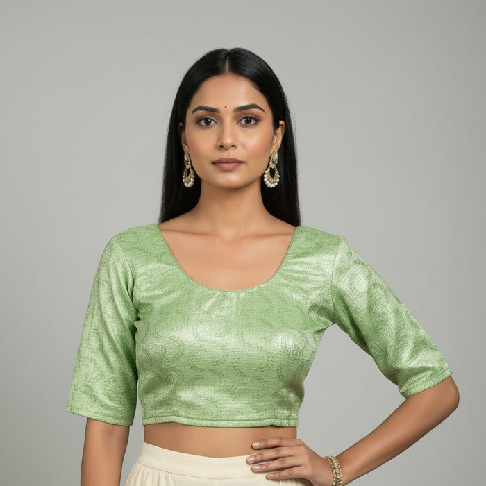 Kurti Connection USA rose pink shimmering embroidered crop top blouse with scoop neck and three-quarter sleeves.