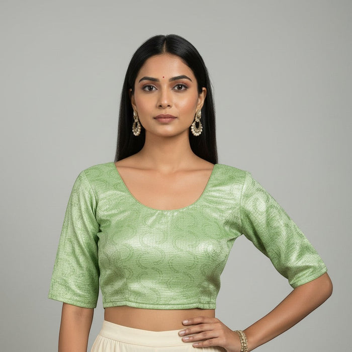 Kurti Connection USA light green embroidered crop top blouse with scoop neck and three-quarter sleeves.