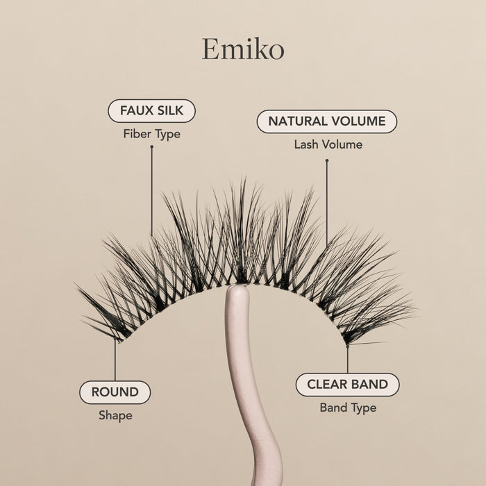 Emiko false eyelash with faux silk fibers, natural volume, round shape, and a clear lash band.