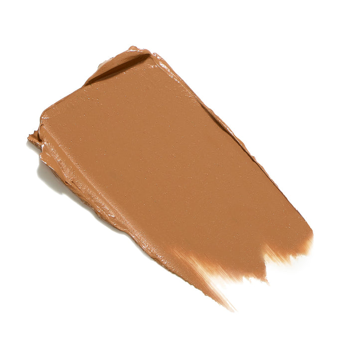 Creamy medium tan swatch of Enlighten Plus Under-Eye Concealer | Jane Iredale, designed for natural coverage in skincare and makeup routines.