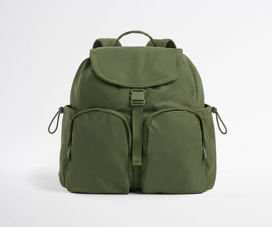 Green backpack on a white background