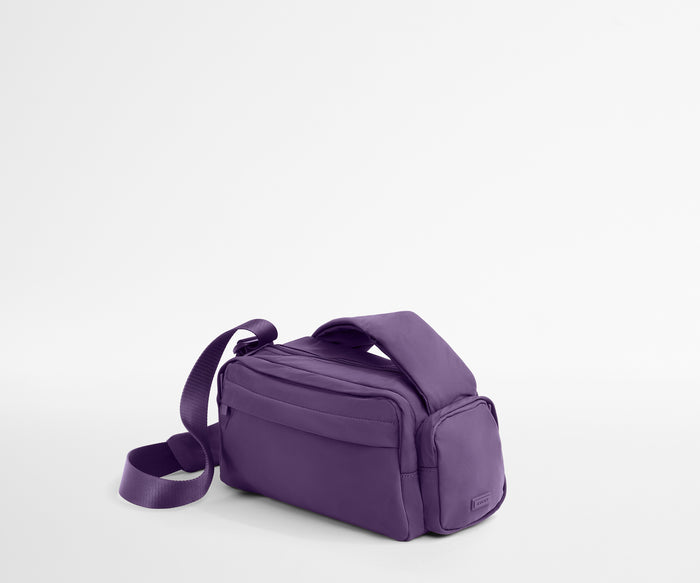 Angled view of the Featherlight Cargo Pack showing the side pocket