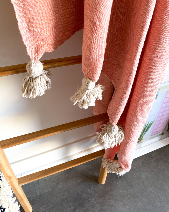 Flamingo handmade woven coral pink and beige Moroccan pom pom blanket