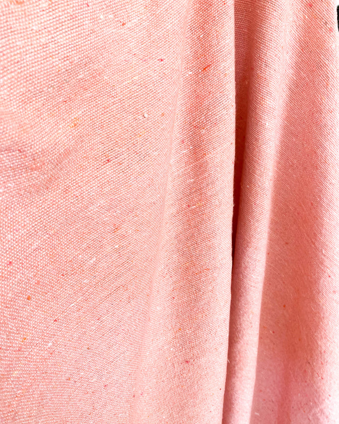 handmade woven coral pink Moroccan pom pom blanket