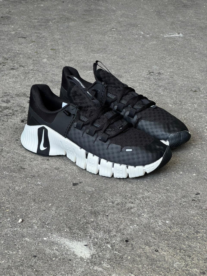 NIKE FREECOM NEGRO BLANCO