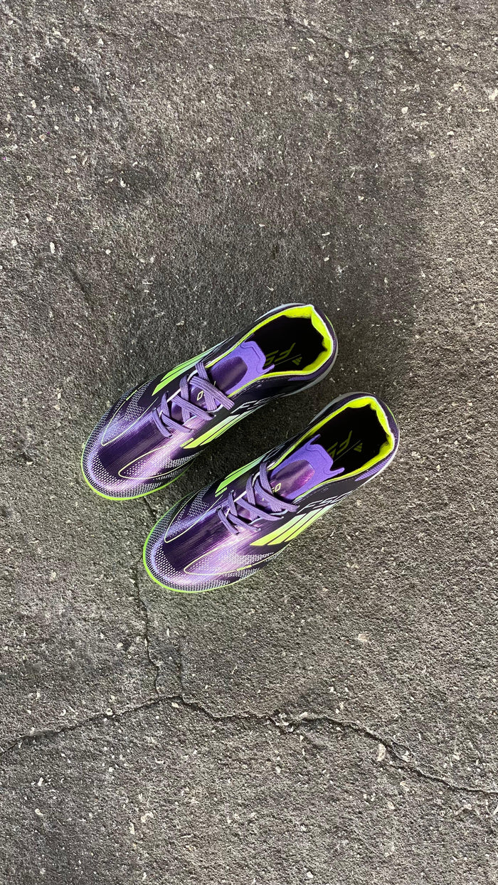 ADIDAS GUAYO F50 NIÑO NEGRO VERDE