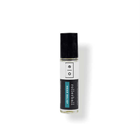 Clear glass rollerball bottle with black cap labeled for Head Relief, designed for tension support, named Head Relief Rollerball - Tension Support | Essence One, used as a wellness tool.