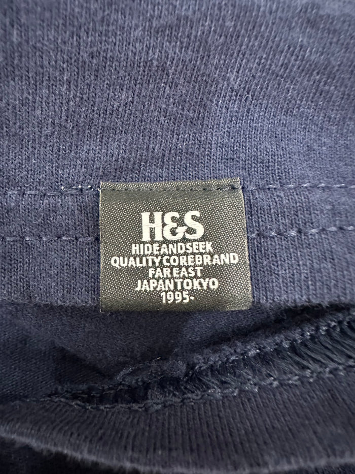 HIDEANDSEEK × Toru Nishiura H&S L/S Tee