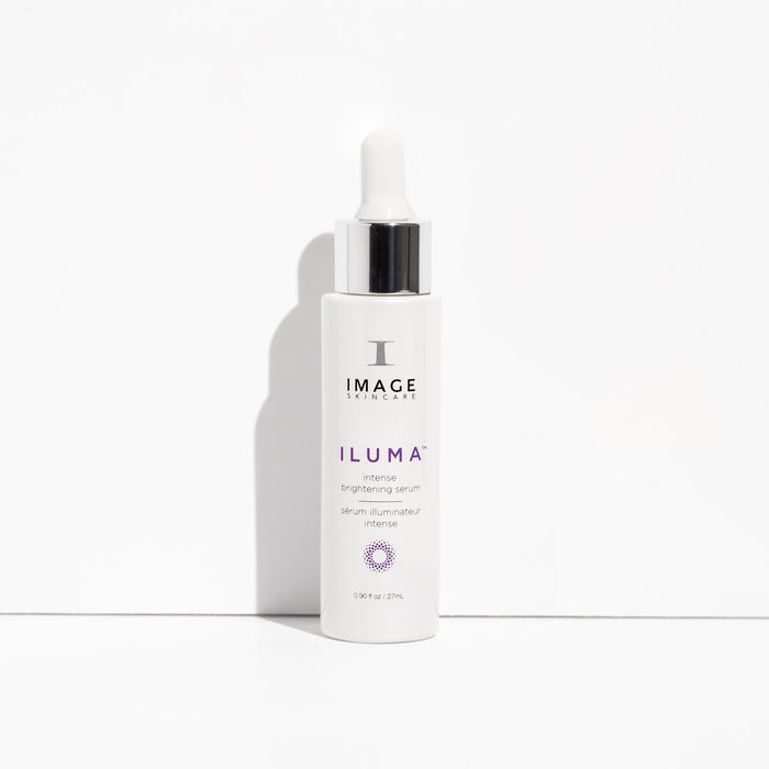 White bottle of ILUMA® intense brightening serum | IMAGE Skincare with a dropper cap, showcased against a clean white background for skincare and wellness promotion.