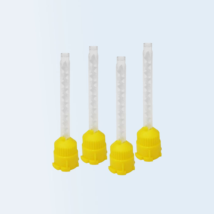 Four dental impression mixing tips with yellow base and clear top