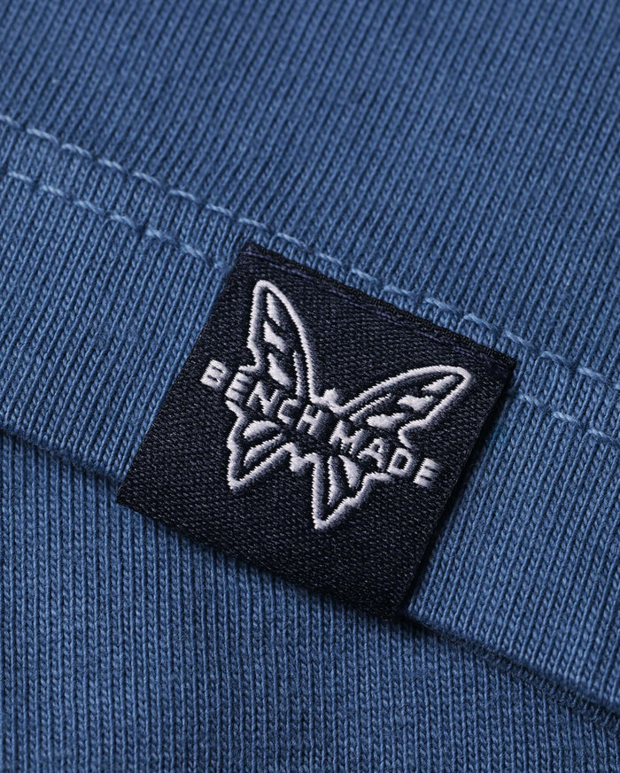 Into The Wild Below Chest Graphic Close-Up on Depth Blue Cotton Tee - Print Detail | Benchmade Knife Co.