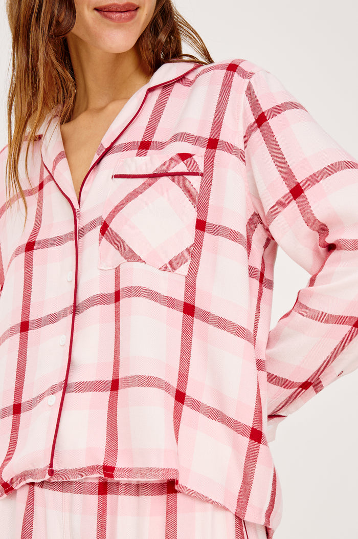 Kellen Pajama Set in Signature Rayon With Relaxed Long Sleeve Button-Up Shirt With Notched Collar and Matching High-Waisted Shorts With Adjustable Drawstring Ties in Pink Cherry Plaid Colorway - Close Up Upper Body View Featured on Model