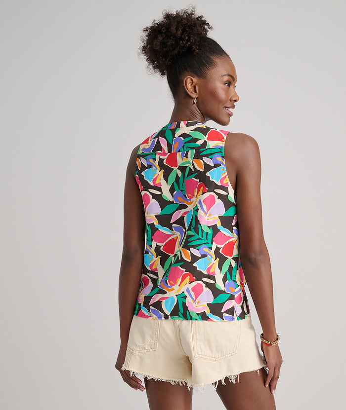 Model is wearing UNTUCKit Frida shirt in printed floral.