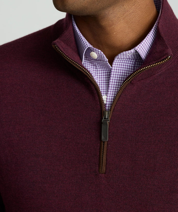 Model is wearing UNTUCKit Belguardo quarter zip in solid maroon.