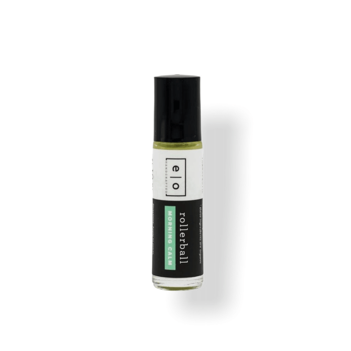 Small clear glass rollerball bottle with black cap containing a light yellow liquid labeled Morning Calm Rollerball - Anxiety Support | Essence One, designed for wellness and skincare.