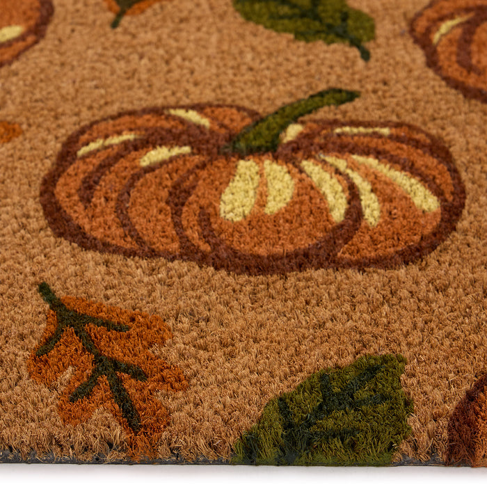 Discover the Multi Pumpkins Coir Doormat- a coir doormat with pumpkins and green/orange leaves.