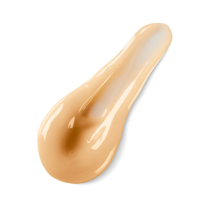 A smooth, beige serum drop with a glossy texture representing NuFACE FIX® Serum | NuFACE for skincare and wellness routines.