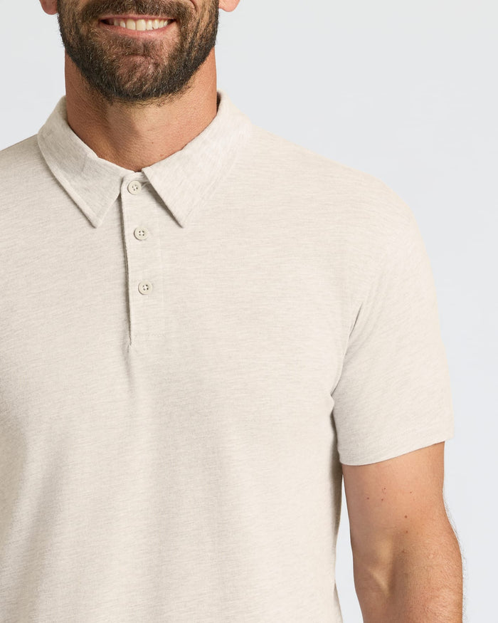 Man wearing light-beige Seasonal Classic Polo 3-Pack with pointed collar and placket.