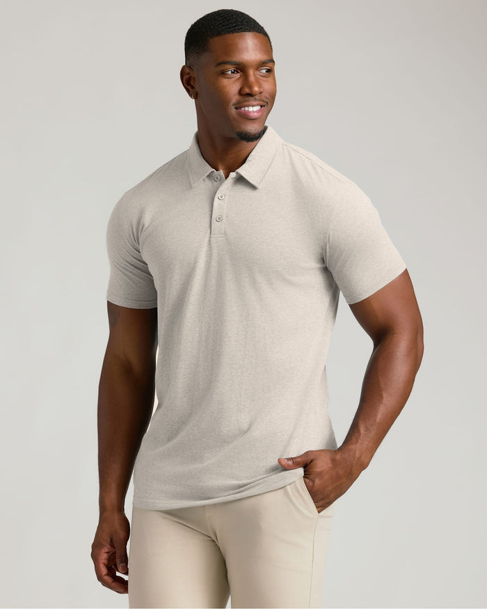 Man in Seasonal Tall Classic Polo 3-Pack, oatmeal color, smiling.