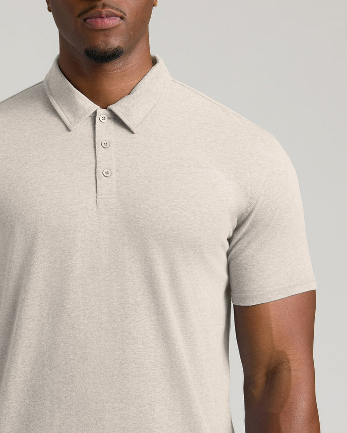 Man wearing light-heathered Seasonal Tall Classic Polo, showcasing collar and placket.